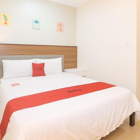 Reddoorz @ Leoncia Apartelle Mandawe Extérieur photo
