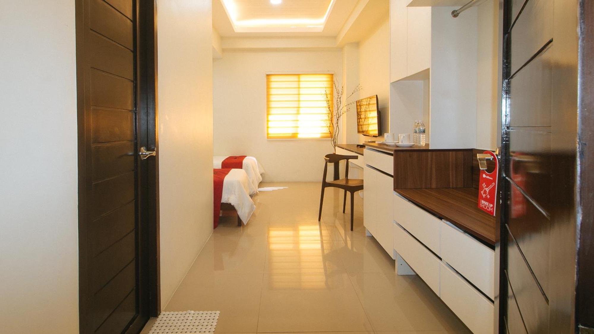 Reddoorz @ Leoncia Apartelle Mandawe Extérieur photo