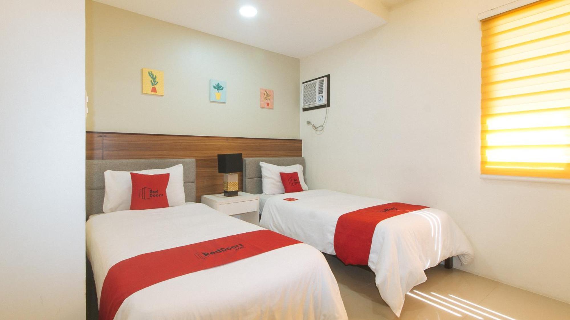 Reddoorz @ Leoncia Apartelle Mandawe Extérieur photo