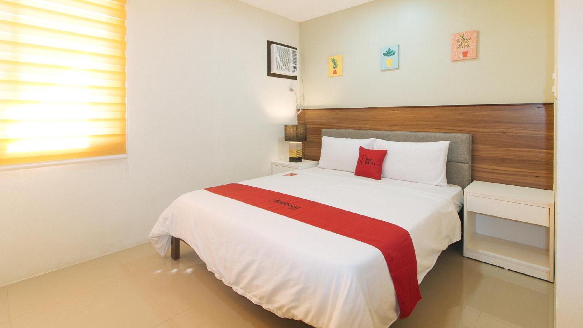 Reddoorz @ Leoncia Apartelle Mandawe Extérieur photo